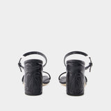 Seal Heeled Sandals - Alexander McQueen - Leather - Black/Argenté
