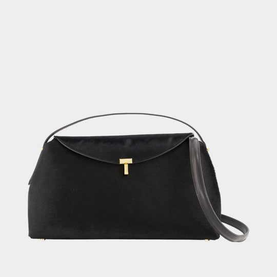 T-Lock Pony Hair Top Handle Purse - TOTEME - Leather - Black