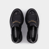 Carter 75 Platform Loafers in Black Leather