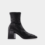Vinyl Ac Ankle Boots in Black