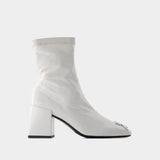 Heritage Vinyl Ankle Boots - Courreges - Leather - Dirty White