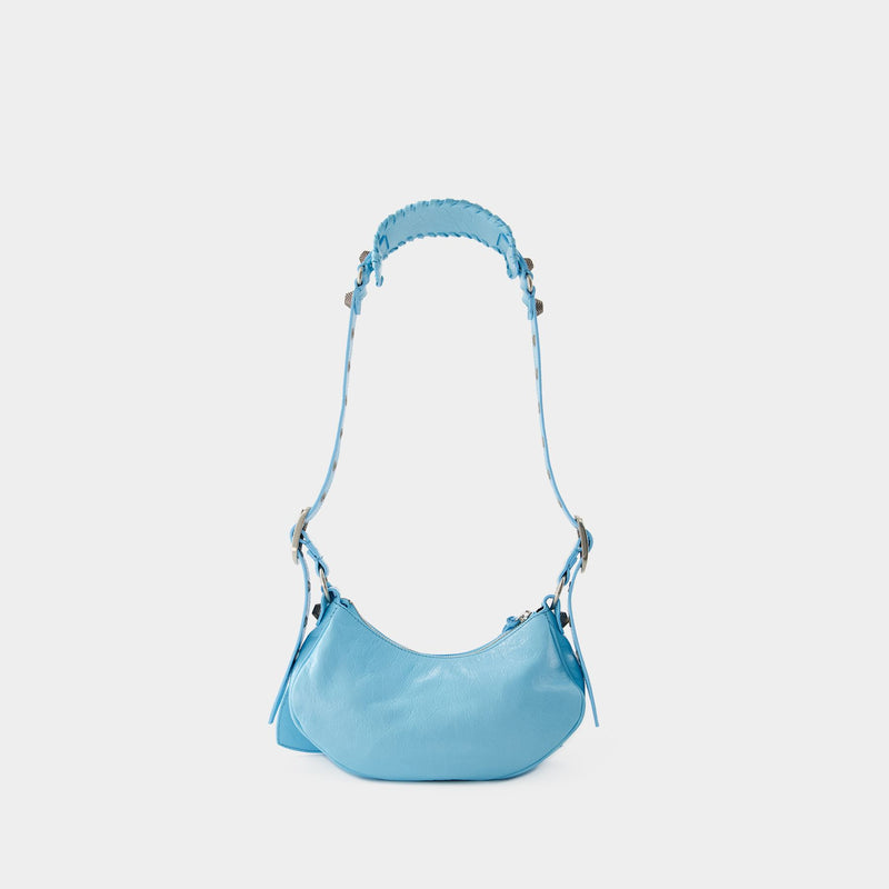 トートバッグ BALENCIAGA Light blue leather Le Cagole XS shoulder bag Balenciaga Le Cagole XS Shoulder Bag | Blue | FARFETCH JO