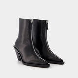 Eclair Zipper Boots in Black Leather