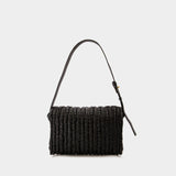 The Busket Baguette Bag in Black Synthetic Leather