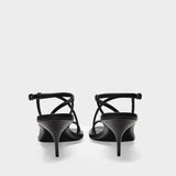 Upper and So Sandals in Black Leather