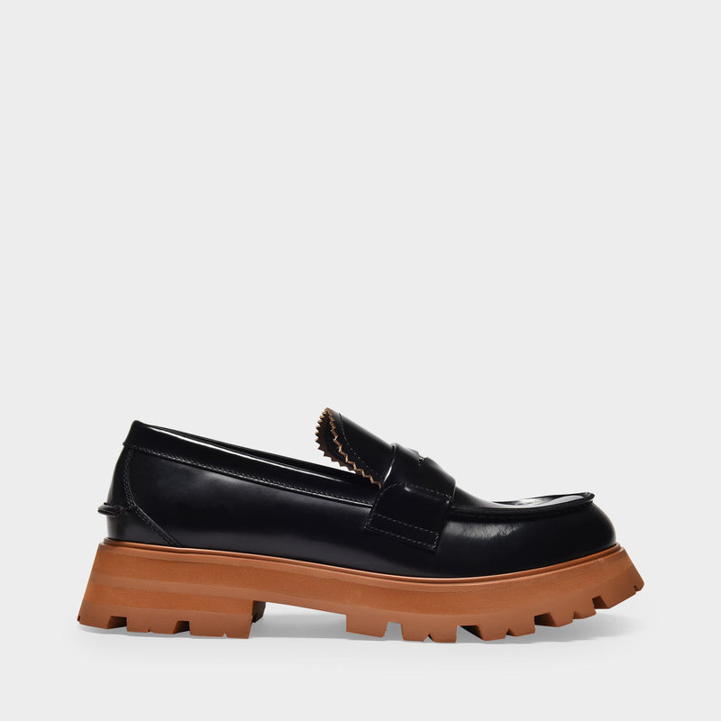 Black leather loafers