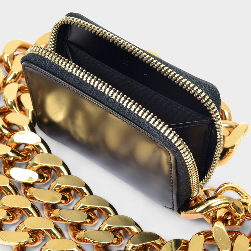 black and gold chanel purse caviar