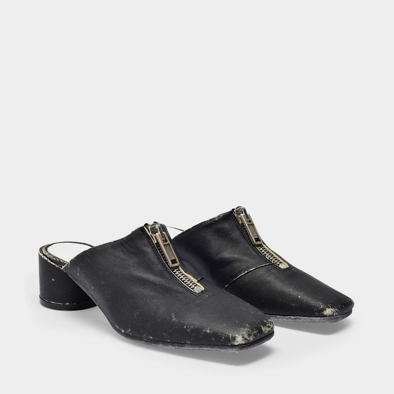 Heeled Mules in Black Leather
