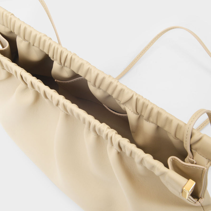 The Bar Clutch Bag in Beige Vegan Leather